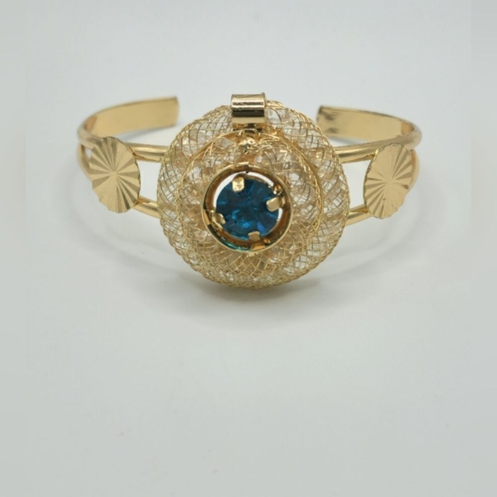Gold sapphire floating stones cuff bracelet